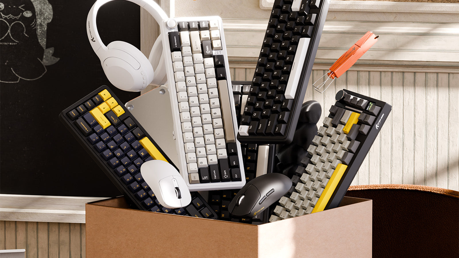 Box filled with various mechanical keyboards, computer mice, and a white headset.