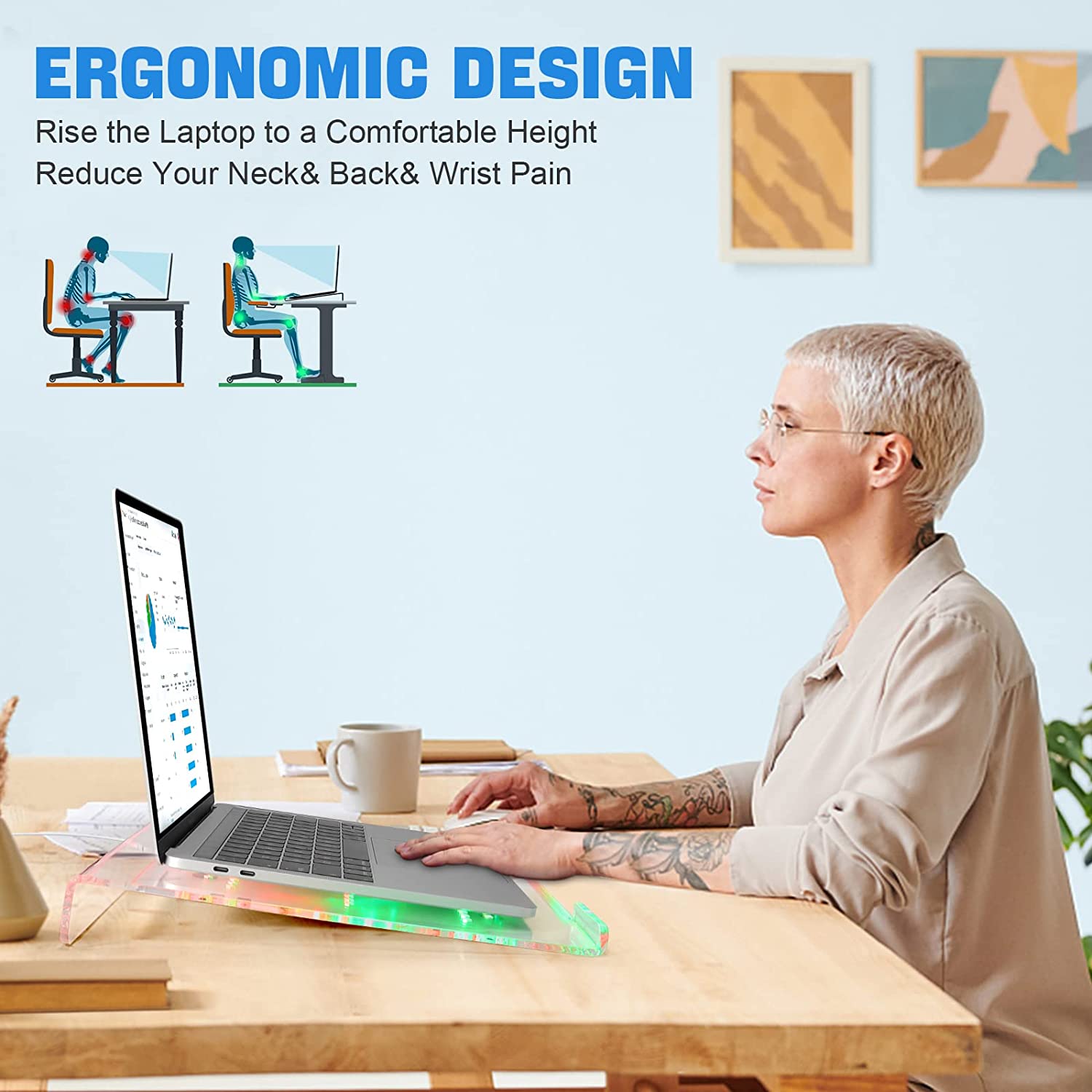 Clear acrylic laptop riser on desk with ergonomic angled design and RGB glow