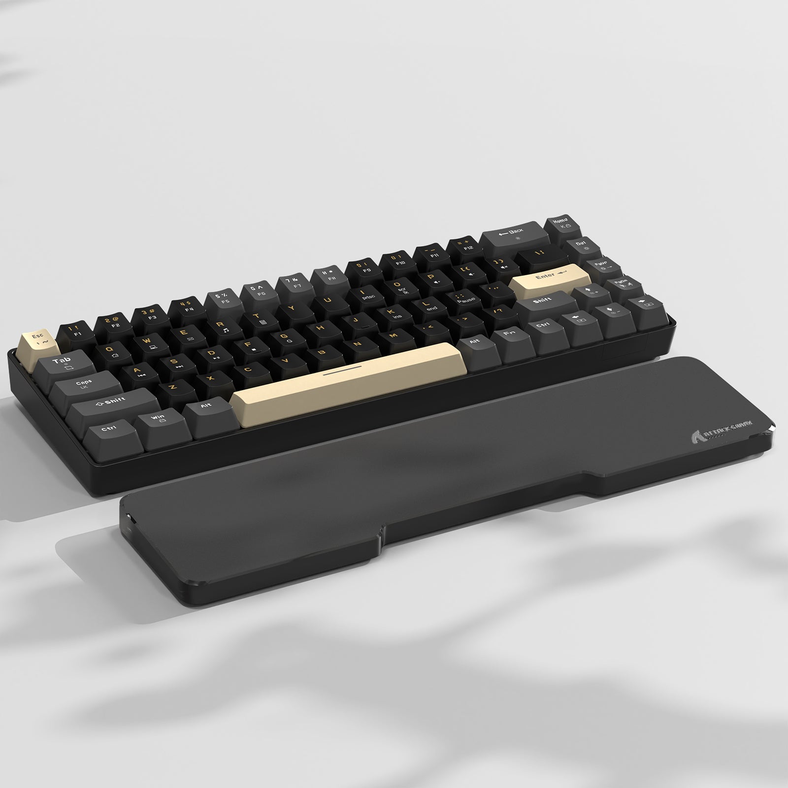 ATTACK SHARK Black Acrylic Wrist Rest with a black and gold keyboard, ergonomic design